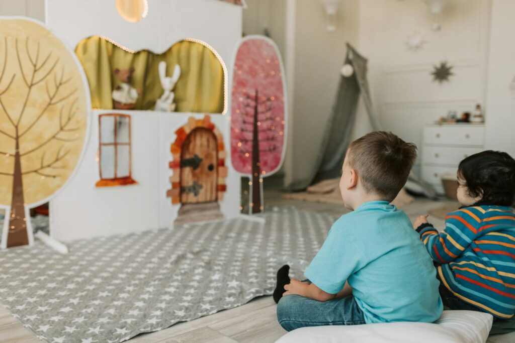 Two Boys Watching a Puppet Show